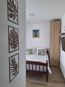 a bedroom with a bed in a room at Apartman ISKRA in Mataruška Banja