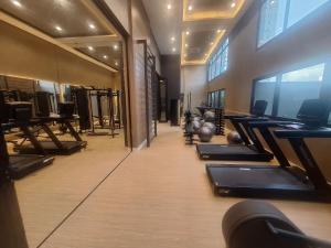 a gym with a row of pilates equipment at Studio Moderno A 2 mim do Metrô Sacomã Wi-Fi 600mb | SP Expo in São Paulo