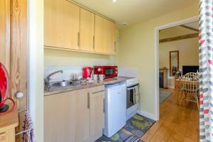 a kitchen with a sink and a counter top at 1 Bed in Falmouth oc-85594 in Constantine +13 photos