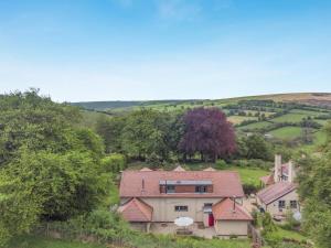 an aerial view of a house in a field at 2 Bed in Minehead oc-77363 in Withypool