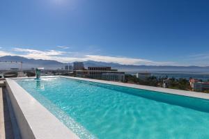 a swimming pool on the roof of a building at Nautico nautico 8a in Puerto Vallarta