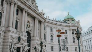 a large white building with a green dome on top at Ruby Marie Hotel Vienna by IHG in Vienna