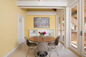 a dining room with a table and chairs at Mountain Mid Century in Sun Valley