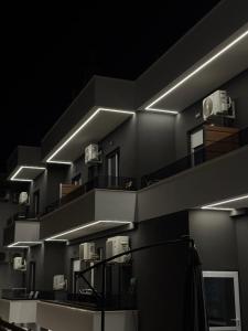a building with stairs with lights on it at Golden Sands in Keramoti