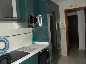 Kuchyň nebo kuchyňský kout v ubytování Apartamento en Jerez de la Frontera 2