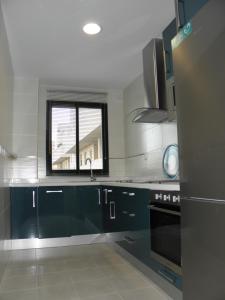 Kuchyň nebo kuchyňský kout v ubytování Apartamento en Jerez de la Frontera 2