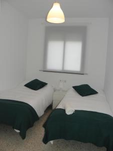 Postel nebo postele na pokoji v ubytování Apartamento en Jerez de la Frontera 2