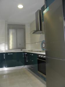 Kuchyň nebo kuchyňský kout v ubytování Apartamento en Jerez de la Frontera 2