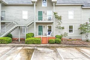 a house with a staircase in front of it at Saturdays In The South in Auburn