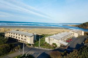 an aerial view of a building next to the beach at Hi-Tide Resort Queen Bed Unit 12 in Moclips