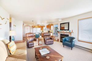 a living room filled with furniture and a fireplace at Hi-Tide Resort Queen Bed Unit 12 in Moclips