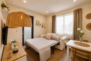 a living room with a couch and a table at Avi Lux Stay in Miami +61 photos