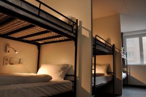Ein Bett oder Betten in einem Zimmer der Unterkunft The ASH