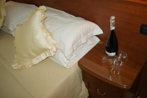 Postelja oz. postelje v sobi nastanitve Hotel Elio