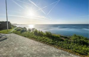 a view of the ocean on a sunny day at Nice Home In Haderslev With Wifi in Haderslev +13 photos