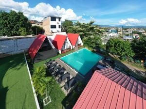 an overhead view of a swimming pool on top of a house at Central Suites in Tarapoto