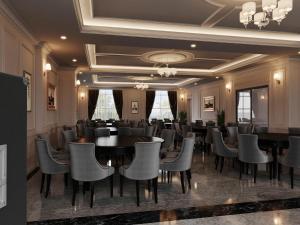 a conference room with a long table and chairs at Hai Dang Hotel Ha Tinh in Hà Tĩnh
