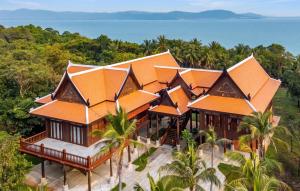 an aerial view of a house with orange roofs at Koh Totung Resort in Kaoh Sdach
