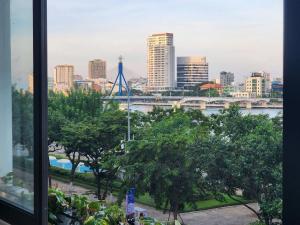 a view from a window of a city with a bridge at Min Sweet Home 2 in Danang