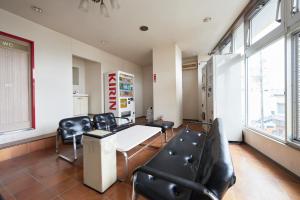 Uma área de estar em Select Inn Shimada Ekimae