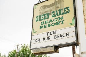 a sign for a green cabbage beach restaurant on our beach at Studio Suite 7 at Green Gables Resort in Osoyoos