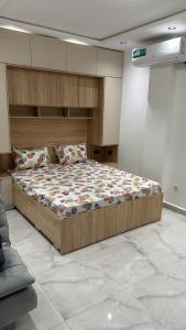a bedroom with a large bed in a room at Allaoua in Stamboul