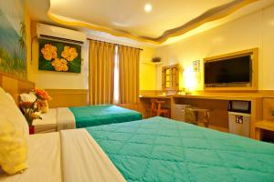 Krevet ili kreveti u jedinici u okviru objekta Bashi Channel Vacation B&B