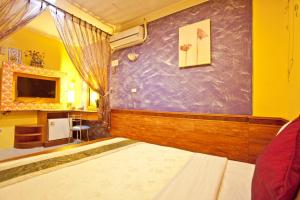 Krevet ili kreveti u jedinici u okviru objekta Bashi Channel Vacation B&B