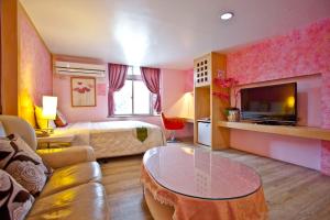 Krevet ili kreveti u jedinici u okviru objekta Bashi Channel Vacation B&B
