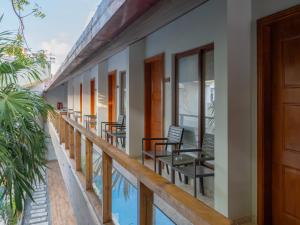 a view of the balcony of a house at Kaani Village & Spa - Stay 3 Nights and Save 20 Percent on Spa and 10 Percent on Dining Until 31 October 2026 in Maafushi