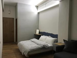 A bed or beds in a room at Welcome Hostel