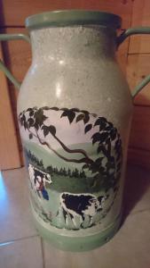 a vase with a cow painted on it at Le Solé Bassurois in Basse-sur-le-Rupt