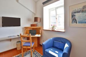 O zonă de relaxare la Apartments im Garten - Haus Anna