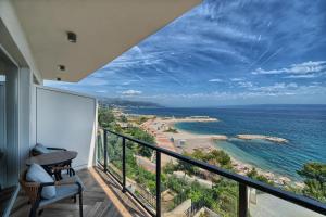 a balcony with a view of the ocean at STELLA'S BEACHFRONT - Aparthotel - FREE PARKING in Split