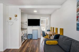a living room with a couch and a table at Haus Gera in Gera