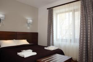 Ένα ή περισσότερα κρεβάτια σε δωμάτιο στο Matia Resort