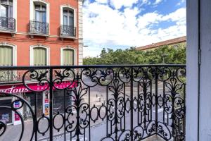 a view from a balcony with a wrought iron fence at Le Balcon Catalan - Perpignan Centre in Perpignan