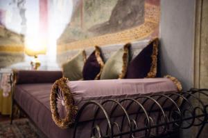 Postel nebo postele na pokoji v ubytování Hotel Burchianti