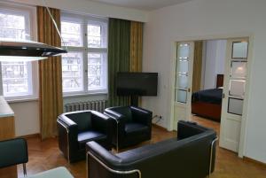TV a/nebo společenská místnost v ubytování Rooms Bytom