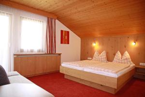 Postel nebo postele na pokoji v ubytování Landhaus Hubert Fiegl
