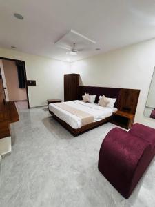 เตียงในห้องที่ Hotel Mb Prime
