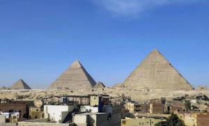 a view of the pyramids of giza at King's Gate Pyramids Horizon in Cairo