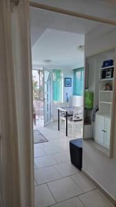 a view of a living room and dining room with a table at Apartment Neno - Terrace & Parking in Veli Lošinj +54 photos