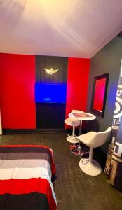 a room with a bed and two chairs and a table at Luxury KIA Room D in Richmond Hill +7 photos