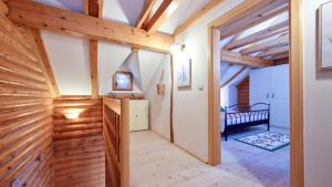 a hallway in a house with wooden walls at Villa Pine Log by Villas Guide in Dubrovčan +51 photos