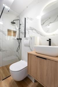 a bathroom with a sink and a toilet and a shower at Azure Adriatic in Prožura +33 photos
