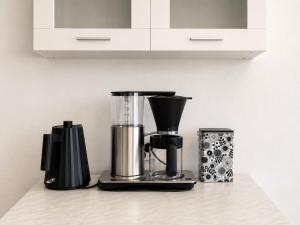 a blender sitting on top of a counter at Kotkan Studio in Kotka