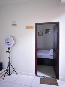 a room with a door leading to a bedroom at Magpie Residency Kalimpong in Kalimpong