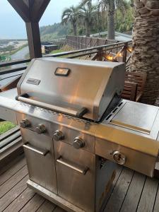 a grill sitting on top of a deck at スパイス平戸 in Hirado