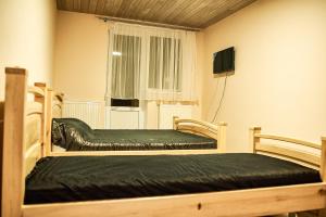 TV a/nebo společenská místnost v ubytování SAMARIANKA hotel
